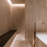 Interior design of a modern bathroom with Iran Cream Travertine
