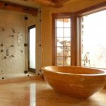 Interior design of a luxury bathtub with Iran Yellow (Giallo) Travertine - Marbleopolis