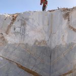 a worker is working in Bliss Gold ( Levin Marble ) Quarry. wh see a beautiful stone in this picture. Marbleopolis is a key supplier of Bliss Gold Marble