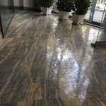 Flooring a business space with Bliss gold marble ( Levin Marble ) bookmatch from marbleopolis